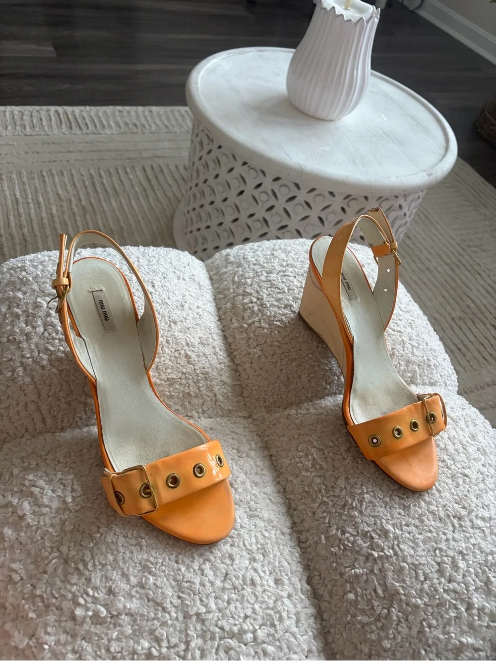Miu Miu Orange Patent Leather Wedge Sandals with Gold Grommets